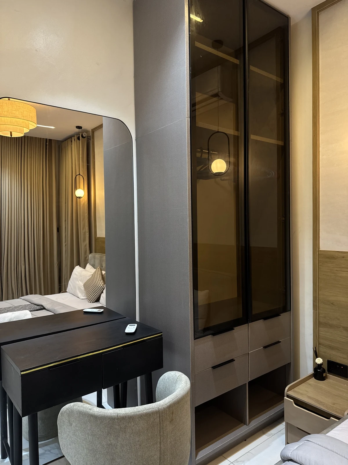 Veyra — bedroom with upholstered bed and warm lighting, view 192