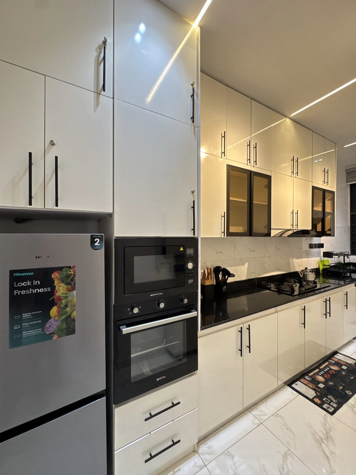 Veyra — fitted kitchen with white cabinets and black counters, view 193
