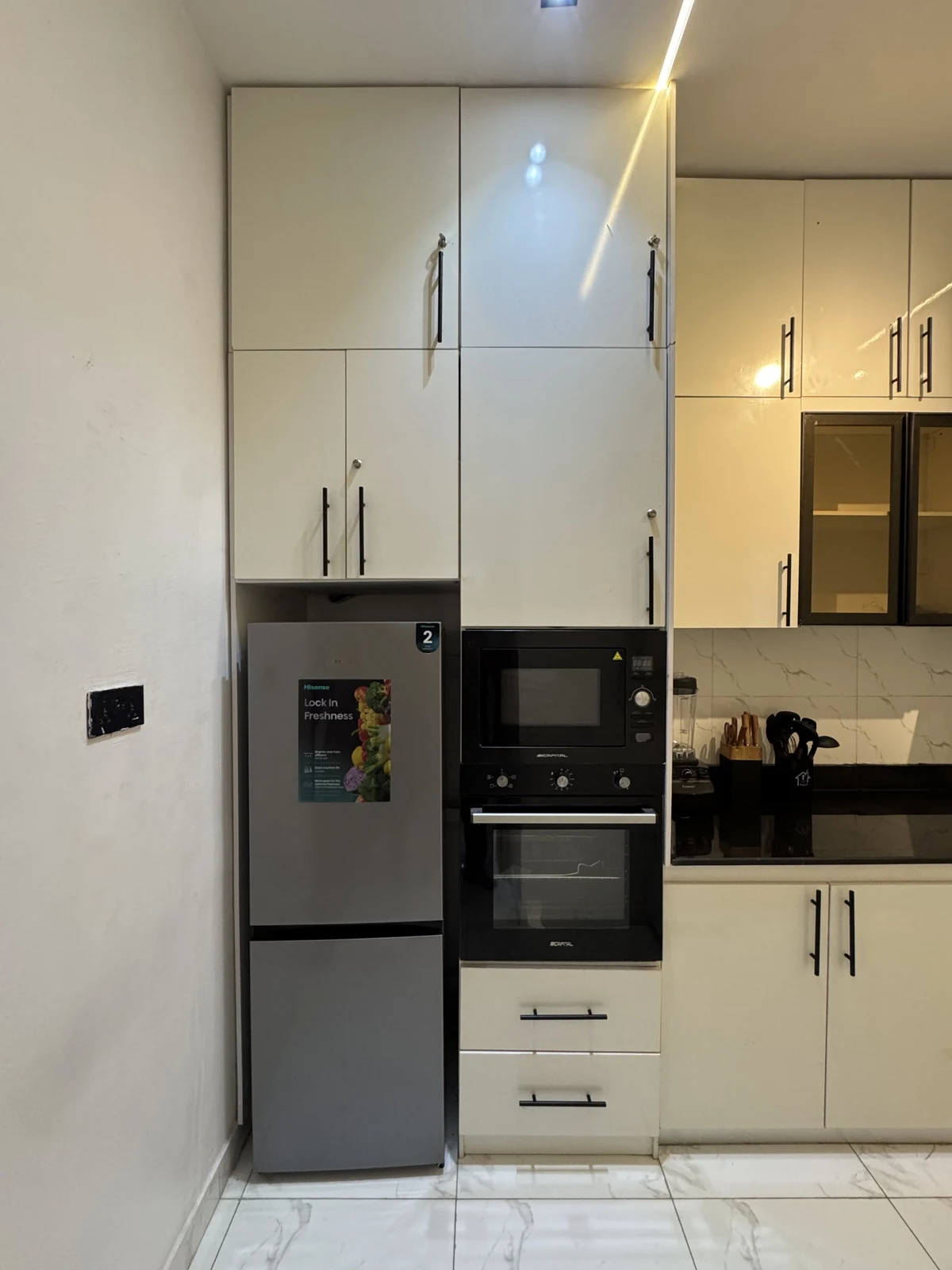 Veyra — fitted kitchen with white cabinets and black counters, view 196