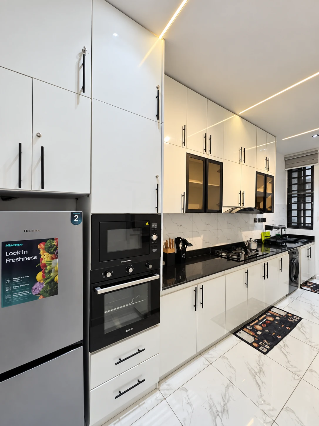 Veyra — fitted kitchen with white cabinets and black counters, view 197