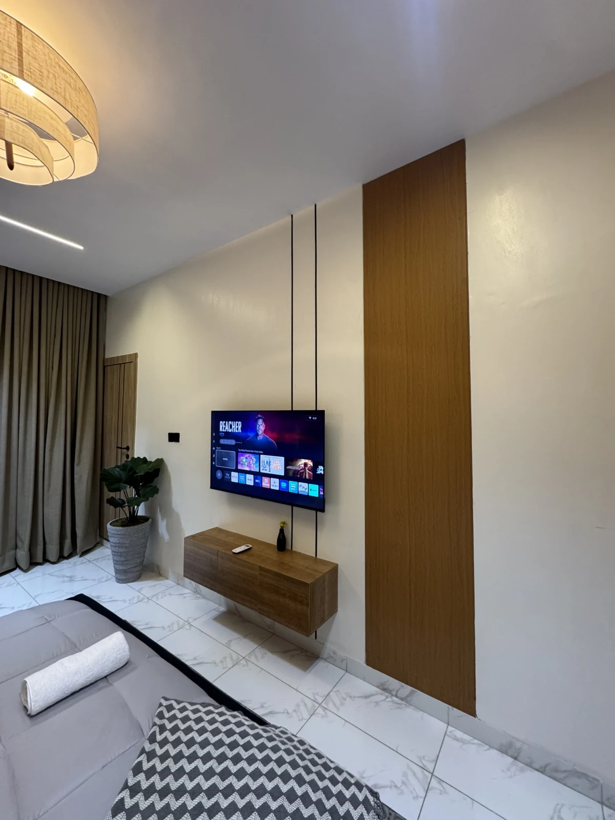 Veyra — bedroom with upholstered bed and warm lighting, view 200