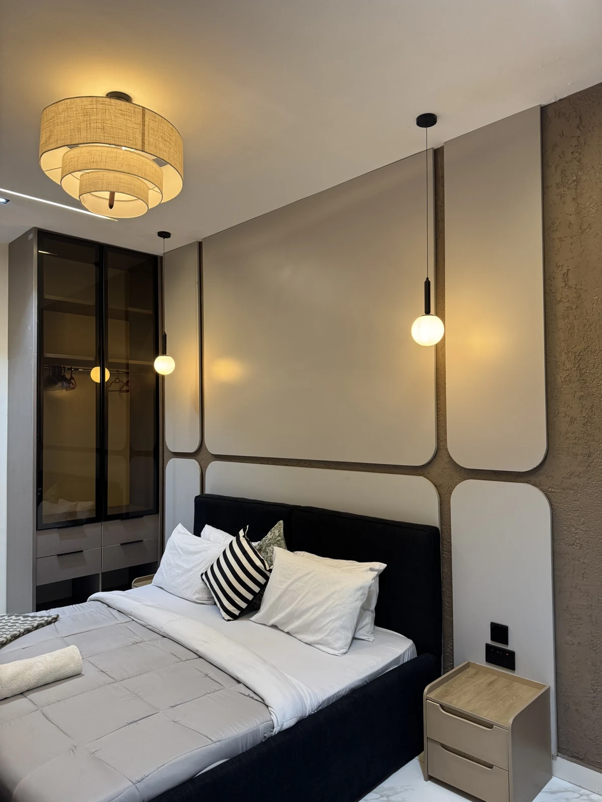 Veyra — bedroom with upholstered bed and warm lighting, view 202