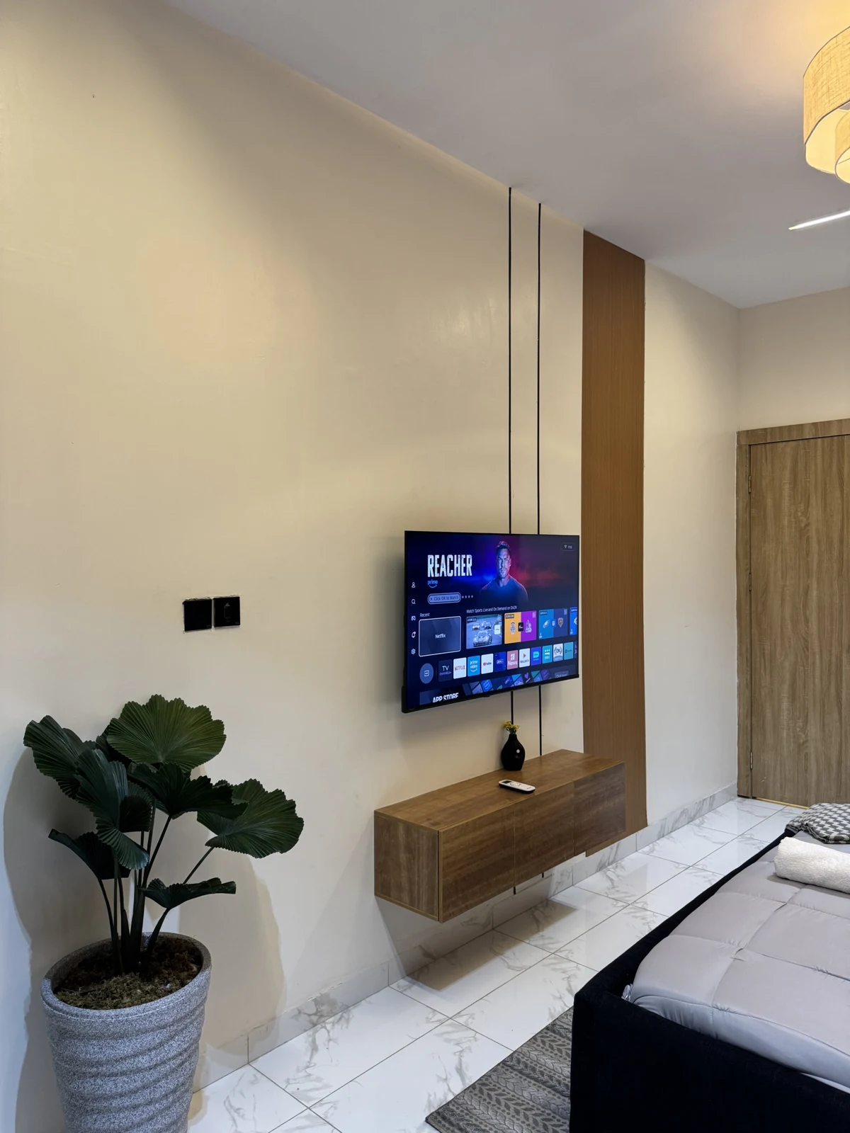 Veyra — bedroom with upholstered bed and warm lighting, view 205